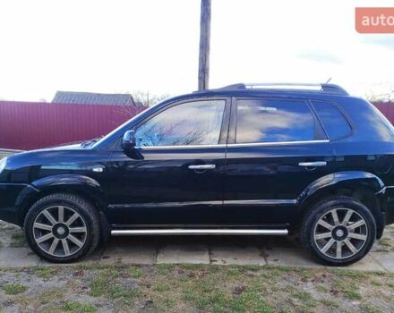 Черный Хендай Туксон, объемом двигателя 2 л и пробегом 208 тыс. км за 6950 $, фото 33 на Automoto.ua