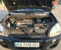 Черный Хендай Туксон, объемом двигателя 2 л и пробегом 253 тыс. км за 7500 $, фото 8 на Automoto.ua