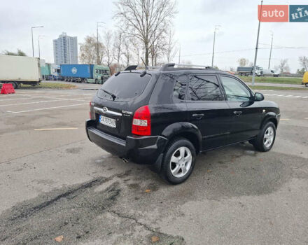 Черный Хендай Туксон, объемом двигателя 2 л и пробегом 170 тыс. км за 6999 $, фото 4 на Automoto.ua