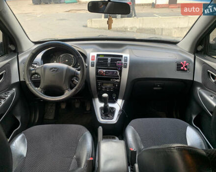 Черный Хендай Туксон, объемом двигателя 2 л и пробегом 219 тыс. км за 8400 $, фото 14 на Automoto.ua