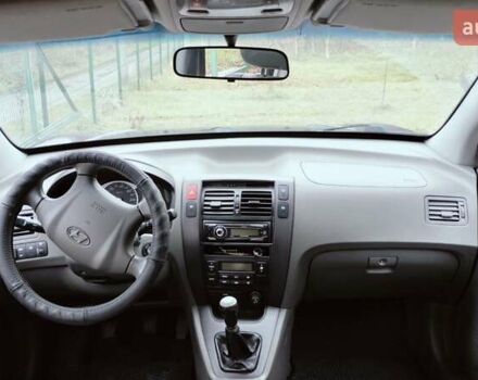 Чорний Хендай Туксон, об'ємом двигуна 1.98 л та пробігом 213 тис. км за 7500 $, фото 12 на Automoto.ua