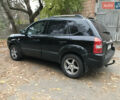 Черный Хендай Туксон, объемом двигателя 2 л и пробегом 261 тыс. км за 6500 $, фото 9 на Automoto.ua