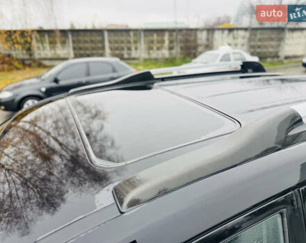 Черный Хендай Туксон, объемом двигателя 1.98 л и пробегом 252 тыс. км за 7300 $, фото 13 на Automoto.ua