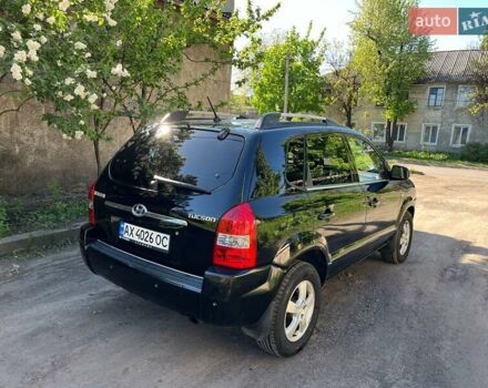 Черный Хендай Туксон, объемом двигателя 2 л и пробегом 232 тыс. км за 6900 $, фото 4 на Automoto.ua