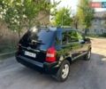 Черный Хендай Туксон, объемом двигателя 2 л и пробегом 232 тыс. км за 6900 $, фото 4 на Automoto.ua