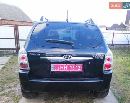 Черный Хендай Туксон, объемом двигателя 2 л и пробегом 208 тыс. км за 6950 $, фото 45 на Automoto.ua