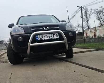 Черный Хендай Туксон, объемом двигателя 2 л и пробегом 190 тыс. км за 7500 $, фото 22 на Automoto.ua