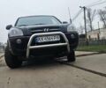 Черный Хендай Туксон, объемом двигателя 2 л и пробегом 190 тыс. км за 7500 $, фото 22 на Automoto.ua