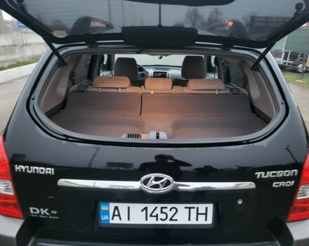 Черный Хендай Туксон, объемом двигателя 2 л и пробегом 180 тыс. км за 4500 $, фото 5 на Automoto.ua