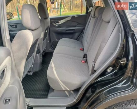 Черный Хендай Туксон, объемом двигателя 1.98 л и пробегом 192 тыс. км за 6900 $, фото 10 на Automoto.ua