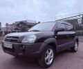 Чорний Хендай Туксон, об'ємом двигуна 1.98 л та пробігом 262 тис. км за 6850 $, фото 1 на Automoto.ua