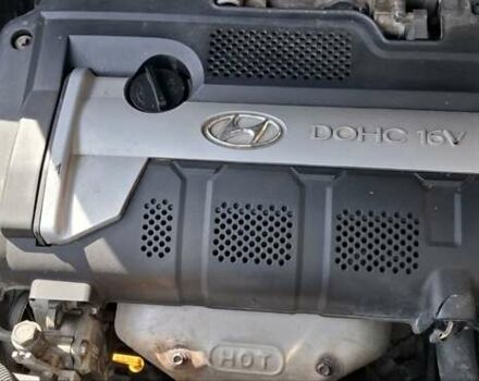 Черный Хендай Туксон, объемом двигателя 1.98 л и пробегом 193 тыс. км за 8000 $, фото 12 на Automoto.ua