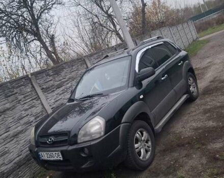 Черный Хендай Туксон, объемом двигателя 2 л и пробегом 224 тыс. км за 6800 $, фото 11 на Automoto.ua