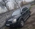 Черный Хендай Туксон, объемом двигателя 2 л и пробегом 224 тыс. км за 6800 $, фото 11 на Automoto.ua