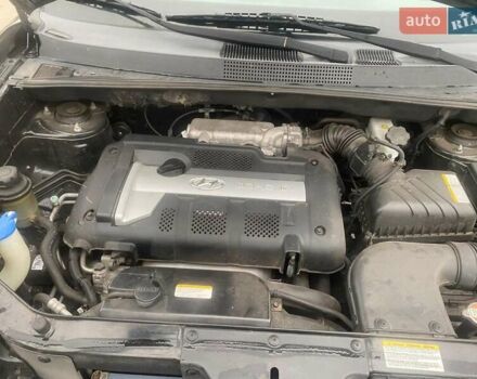 Черный Хендай Туксон, объемом двигателя 2 л и пробегом 190 тыс. км за 7500 $, фото 11 на Automoto.ua