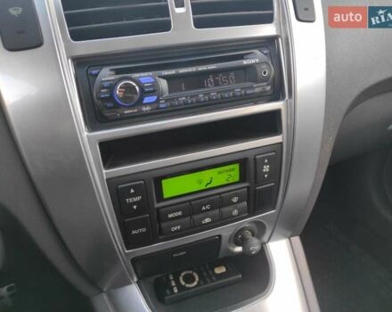 Черный Хендай Туксон, объемом двигателя 2 л и пробегом 208 тыс. км за 6950 $, фото 11 на Automoto.ua