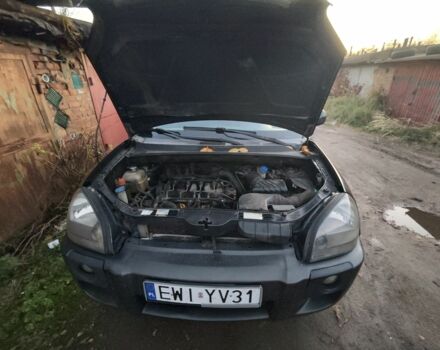 Черный Хендай Туксон, объемом двигателя 2 л и пробегом 370 тыс. км за 3300 $, фото 3 на Automoto.ua