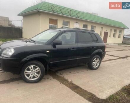 Черный Хендай Туксон, объемом двигателя 2 л и пробегом 190 тыс. км за 7500 $, фото 23 на Automoto.ua