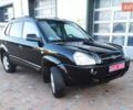 Черный Хендай Туксон, объемом двигателя 2 л и пробегом 260 тыс. км за 6750 $, фото 35 на Automoto.ua