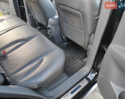 Черный Хендай Туксон, объемом двигателя 2 л и пробегом 208 тыс. км за 6950 $, фото 25 на Automoto.ua