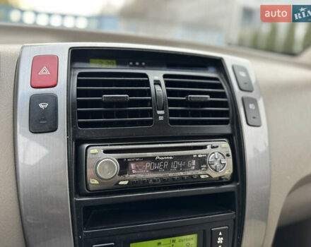 Черный Хендай Туксон, объемом двигателя 2.7 л и пробегом 220 тыс. км за 6400 $, фото 13 на Automoto.ua