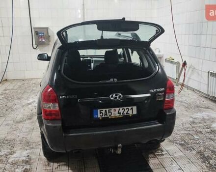 Черный Хендай Туксон, объемом двигателя 2 л и пробегом 284 тыс. км за 4700 $, фото 1 на Automoto.ua