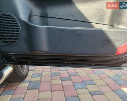Черный Хендай Туксон, объемом двигателя 2 л и пробегом 315 тыс. км за 7000 $, фото 8 на Automoto.ua