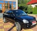 Чорний Хендай Туксон, об'ємом двигуна 1.98 л та пробігом 229 тис. км за 7400 $, фото 1 на Automoto.ua