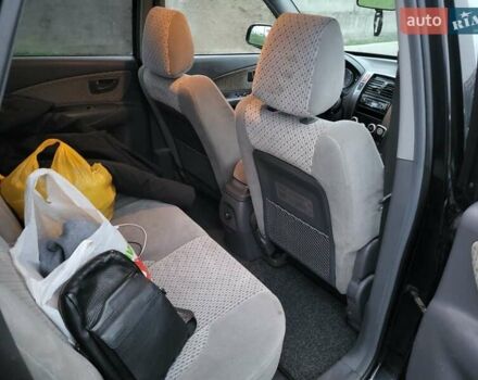 Чорний Хендай Туксон, об'ємом двигуна 2 л та пробігом 180 тис. км за 4500 $, фото 10 на Automoto.ua