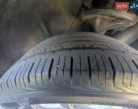 Черный Хендай Туксон, объемом двигателя 1.98 л и пробегом 226 тыс. км за 6500 $, фото 15 на Automoto.ua