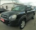 Черный Хендай Туксон, объемом двигателя 2 л и пробегом 252 тыс. км за 7300 $, фото 1 на Automoto.ua