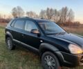 Черный Хендай Туксон, объемом двигателя 1.98 л и пробегом 135 тыс. км за 3950 $, фото 1 на Automoto.ua