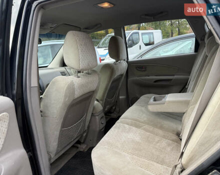 Черный Хендай Туксон, объемом двигателя 2 л и пробегом 211 тыс. км за 4444 $, фото 11 на Automoto.ua