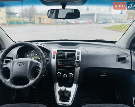 Черный Хендай Туксон, объемом двигателя 1.98 л и пробегом 252 тыс. км за 7300 $, фото 21 на Automoto.ua