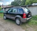 Черный Хендай Туксон, объемом двигателя 2 л и пробегом 238 тыс. км за 8200 $, фото 4 на Automoto.ua