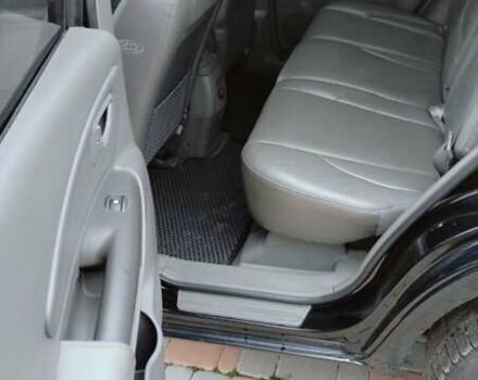 Чорний Хендай Туксон, об'ємом двигуна 1.98 л та пробігом 213 тис. км за 7500 $, фото 11 на Automoto.ua