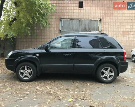 Черный Хендай Туксон, объемом двигателя 2 л и пробегом 261 тыс. км за 6500 $, фото 10 на Automoto.ua