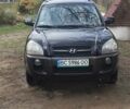 Черный Хендай Туксон, объемом двигателя 2 л и пробегом 299 тыс. км за 6000 $, фото 1 на Automoto.ua