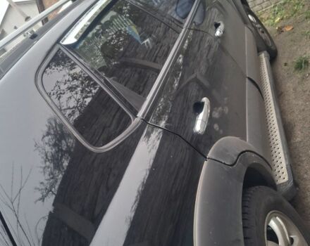 Черный Хендай Туксон, объемом двигателя 2 л и пробегом 224 тыс. км за 6800 $, фото 11 на Automoto.ua