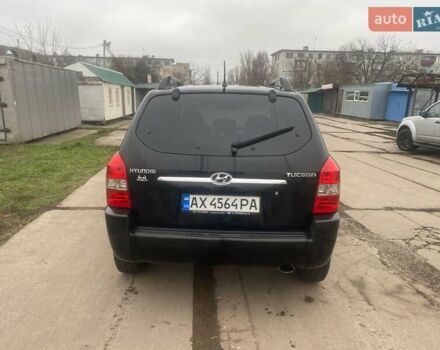 Черный Хендай Туксон, объемом двигателя 2 л и пробегом 190 тыс. км за 7500 $, фото 2 на Automoto.ua