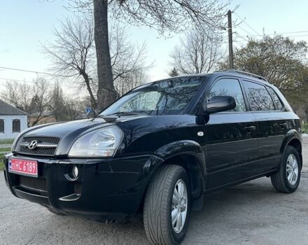 Черный Хендай Туксон, объемом двигателя 2 л и пробегом 137 тыс. км за 7499 $, фото 3 на Automoto.ua