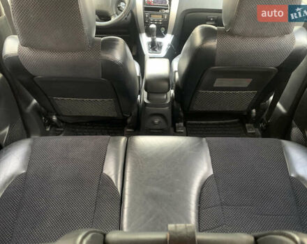 Черный Хендай Туксон, объемом двигателя 2 л и пробегом 219 тыс. км за 8400 $, фото 13 на Automoto.ua