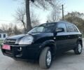 Черный Хендай Туксон, объемом двигателя 2 л и пробегом 137 тыс. км за 7499 $, фото 3 на Automoto.ua