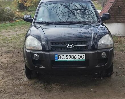 Черный Хендай Туксон, объемом двигателя 2 л и пробегом 299 тыс. км за 6000 $, фото 2 на Automoto.ua