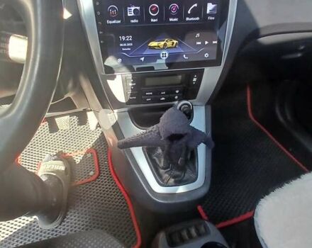 Черный Хендай Туксон, объемом двигателя 2 л и пробегом 315 тыс. км за 7000 $, фото 1 на Automoto.ua