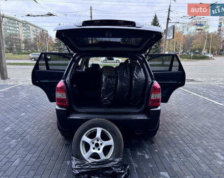 Хендай Туксон 2005 у Полтаві на Automoto.ua Чорний Хендай Туксон, об'ємом двигуна 1.98 л та пробігом 175 тис. км за 7700 $, фото 18 на Automoto.ua
