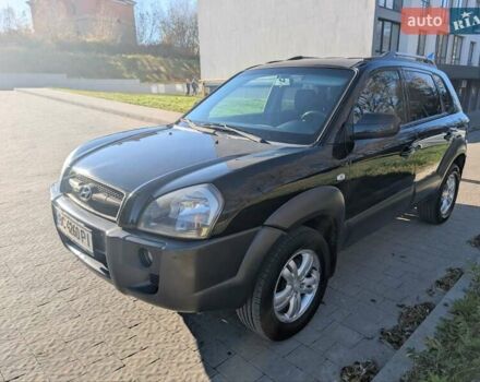 Черный Хендай Туксон, объемом двигателя 1.98 л и пробегом 226 тыс. км за 6500 $, фото 4 на Automoto.ua