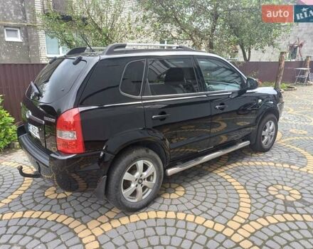 Чорний Хендай Туксон, об'ємом двигуна 1.98 л та пробігом 237 тис. км за 7500 $, фото 3 на Automoto.ua
