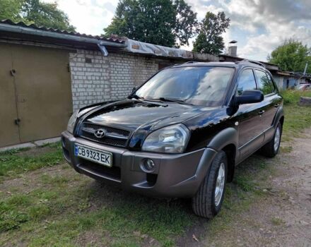 Черный Хендай Туксон, объемом двигателя 2 л и пробегом 238 тыс. км за 8200 $, фото 1 на Automoto.ua