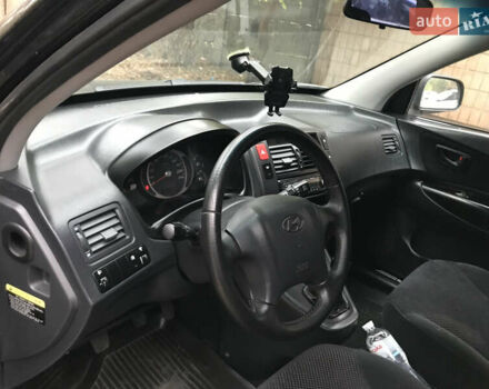 Черный Хендай Туксон, объемом двигателя 2 л и пробегом 261 тыс. км за 6500 $, фото 14 на Automoto.ua